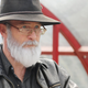 Kaye in his full getup as Pratchett in Back in Black.